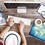 Travel planning on computer.