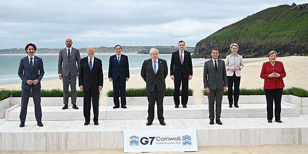   Canadian Prime Minister Justin Trudeau, President of the European Council Charles Michel, US President Joe Biden, Japanese Prime Minister Yoshihide Suga, British Prime Minister Boris Johnson, Italian Prime Minister Mario Draghi, French President Emmanuel Macron, President of the European Commission Ursula von der Leyen and German Chancellor Angela Merkel, pose for the Leaders official welcome and family photo during the G7 Summit In Carbis Bay, on June 11, 2021 in Carbis Bay, Cornwall.