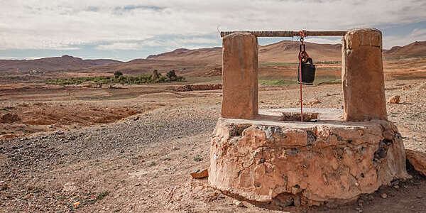 Nature scenic background with old-fashioned well, Anti-Atlas (or Lesser Atlas) mountain range, Morocco, North Africa